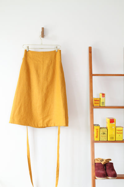 EVERYDAY BEAUTIFUL A-LINE APRON WRAP SKIRT IN MUSTARD LINEN