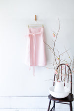 EVERYDAY BEAUTIFUL A-LINE APRON WRAP SKIRT IN SOFT PINK LINEN